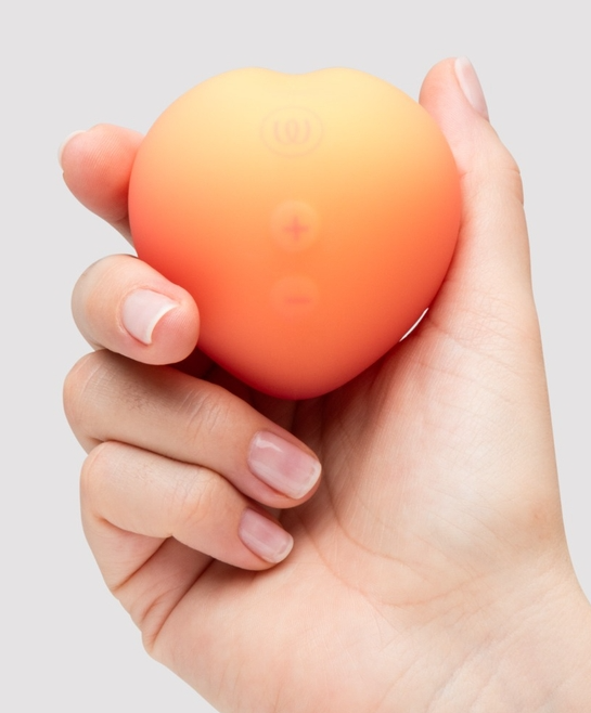 Womanizer Peach Toy Pleasure Air Klitorisstimulator bei Amorana inkl. Lieferung