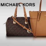 Taschen von Michael Kors bei DeinDeal um bis zu 49% reduziert, z.B. Leder-Shoppingtasche Jet Set Travel Medium Multifonctions - Koralle für CHF 249.- statt CHF 359.-